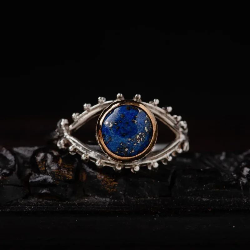 An image of a Sterling Silver Lapis Evil Eye Ring, handcrafted in Greece by Marren Jewelry studio.