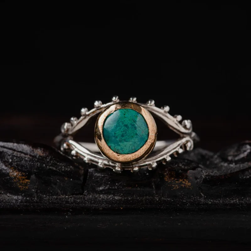 A photo of a Chrysocolla Evil Eye Ring, created in hand by Marren Jewelry in Greece