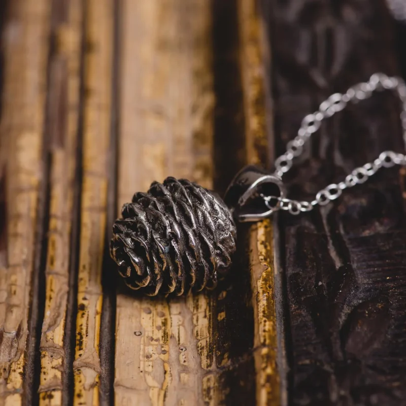 An image of a Pinecone Sterling Silver Pendant, handcrafted in Greece by Marren Jewelry studio.
