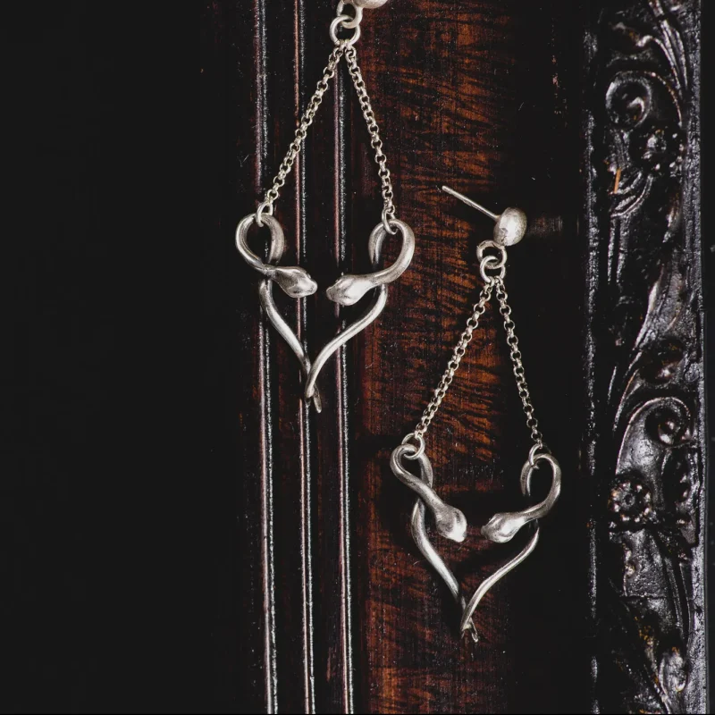 A photo of Snake Chandelier Sterling Silver Earrings, handcrafted by Marren Jewelry