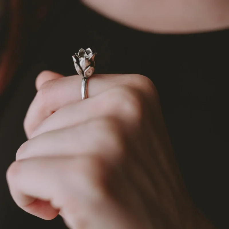 An image of a Large Succulent Bud Sterling Silver Ring worn on a woman's finger. The ring is handcrafted in Greece at Marren Jewelry studio.