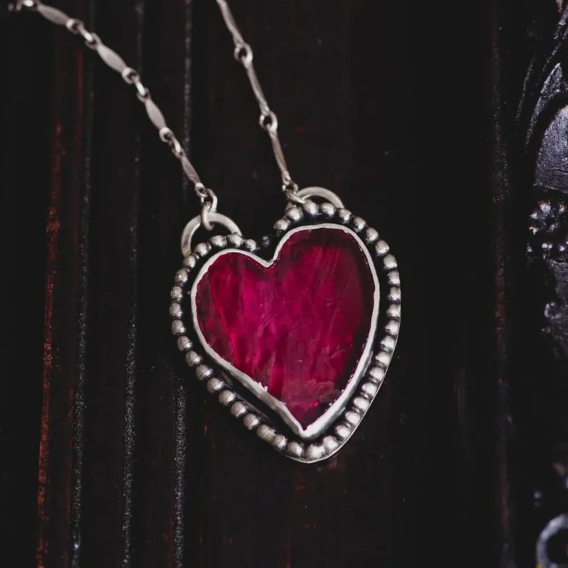 An image of a Black Obsidian Heart Necklace in Sterling Silver, handcrafted by Marren Jewelry in Greece