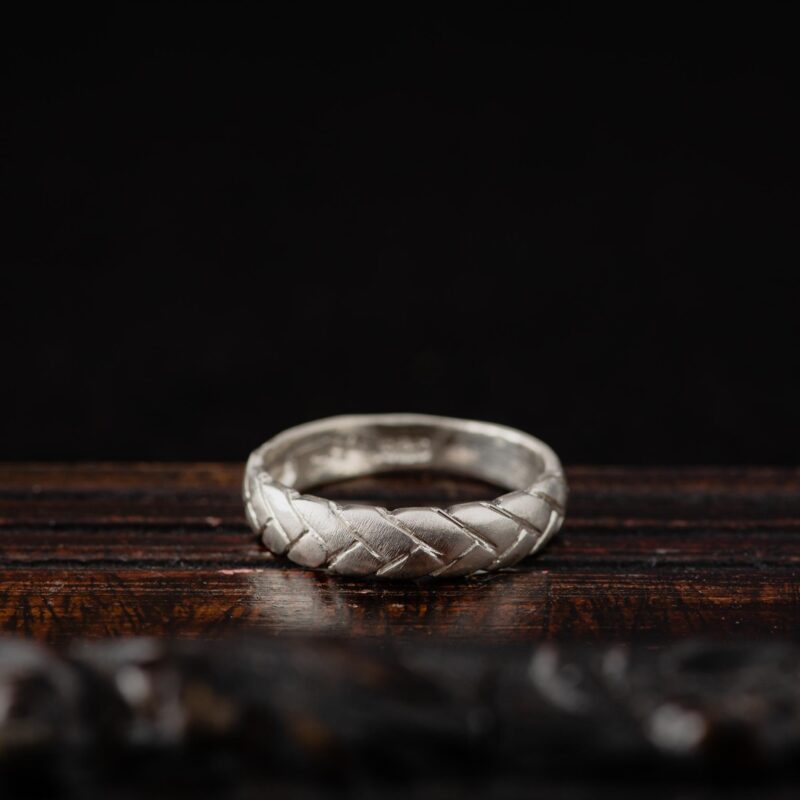 A photo of a Braided Sterling Silver Ring, handcrafted in Greece by Marren Jewelry