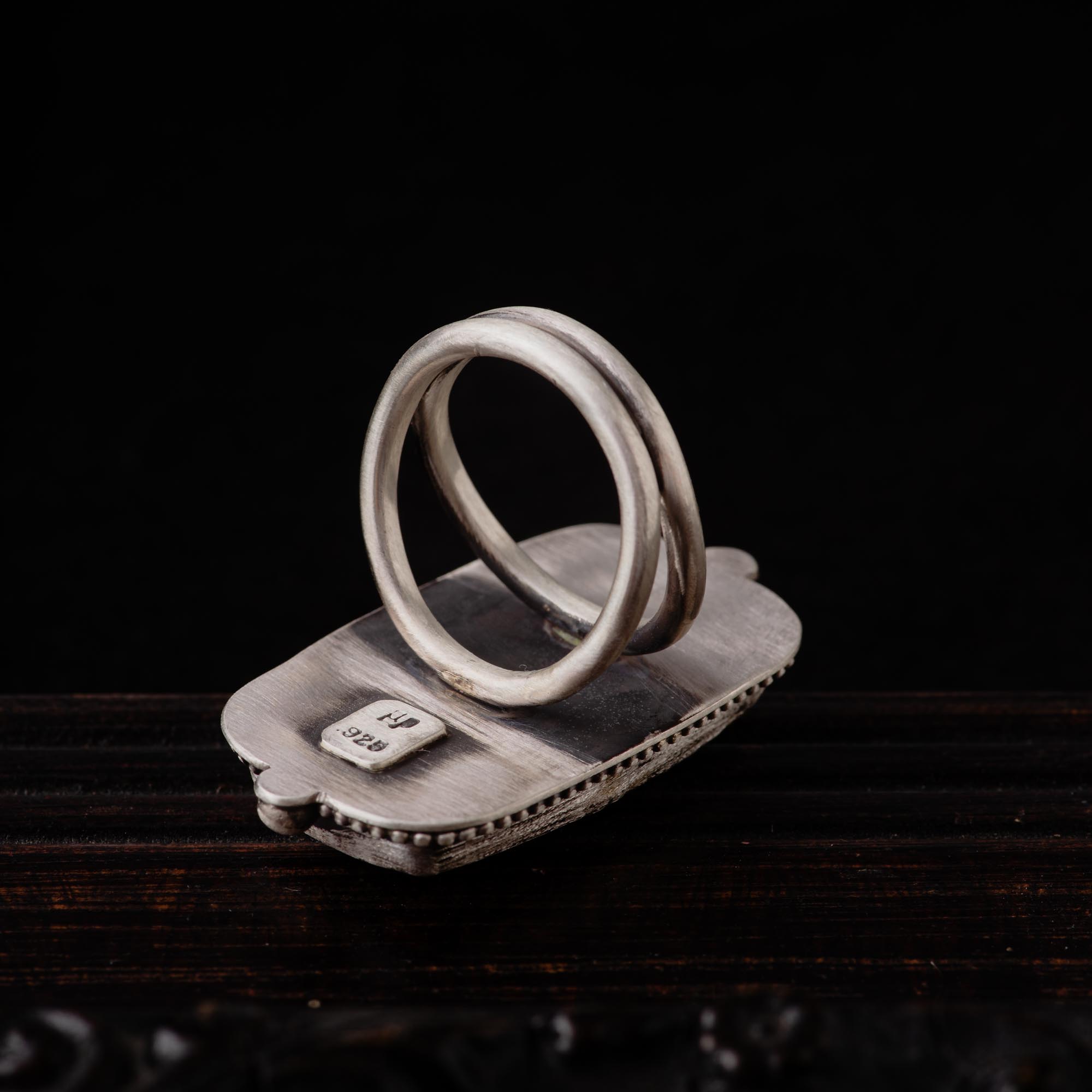 A rectangular grey selenite sterling silver ring