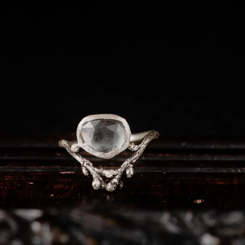 An image showing a subtle grey tourmaline sterling silver twig ring