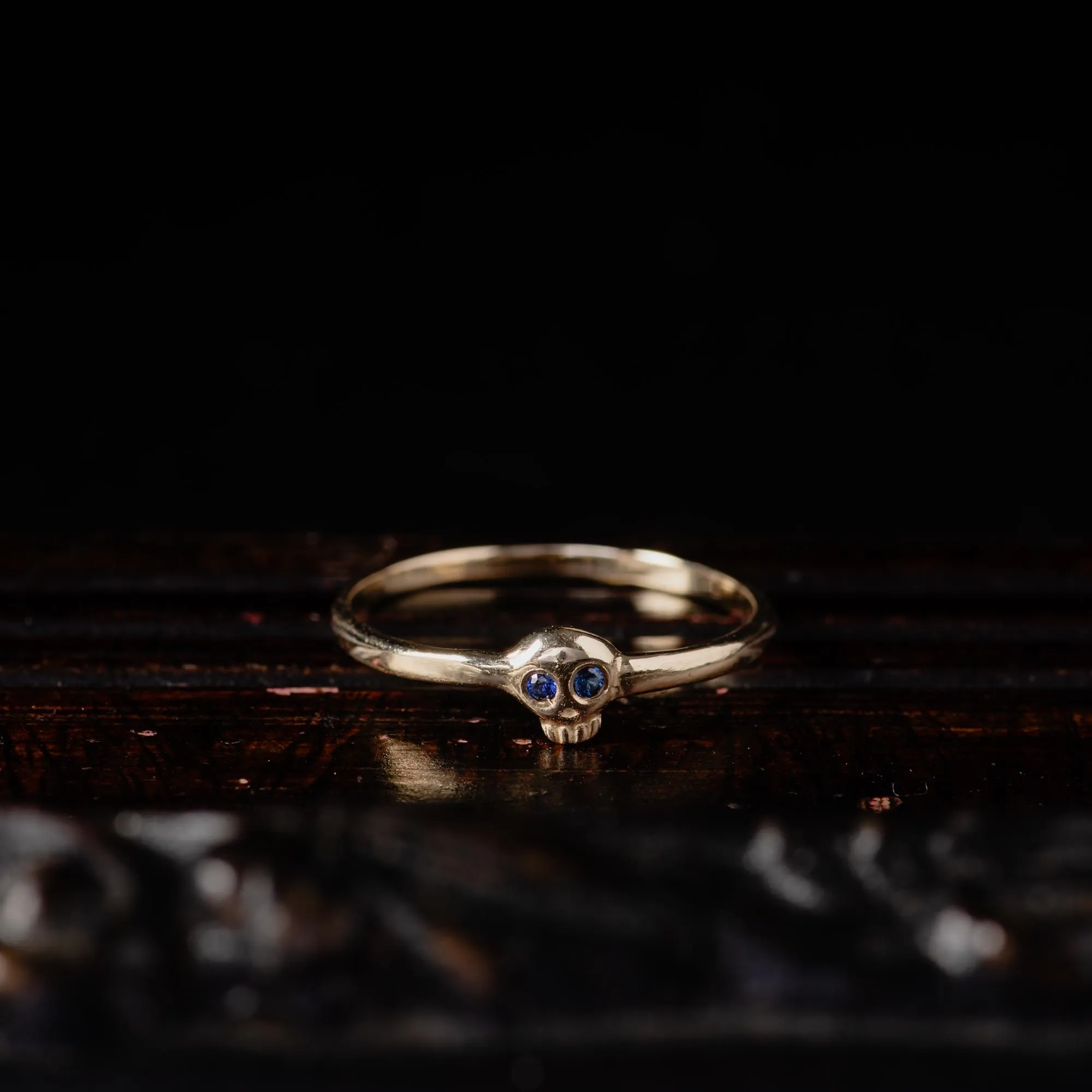 14K Gold Tiny Skull Ring with Blue Sapphire Eyes - Image 4