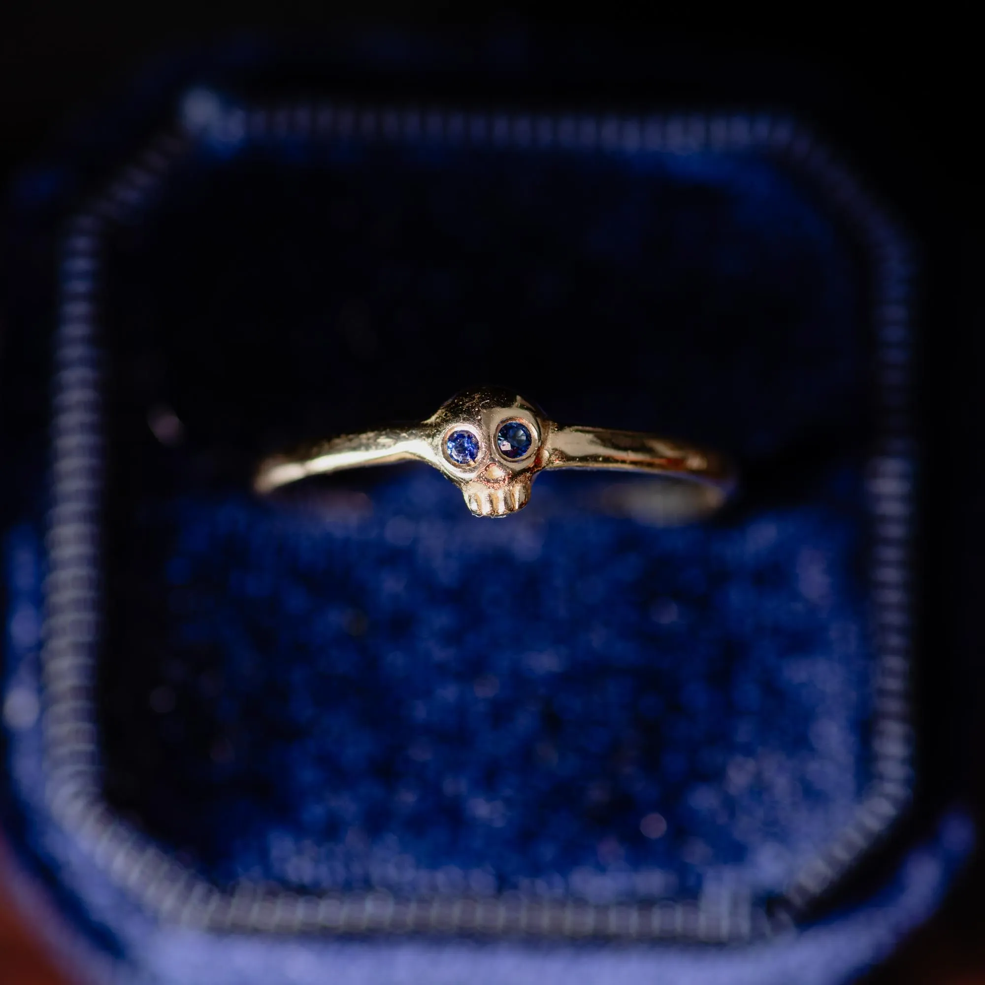 14K Gold Tiny Skull Ring with Blue Sapphire Eyes - Image 2
