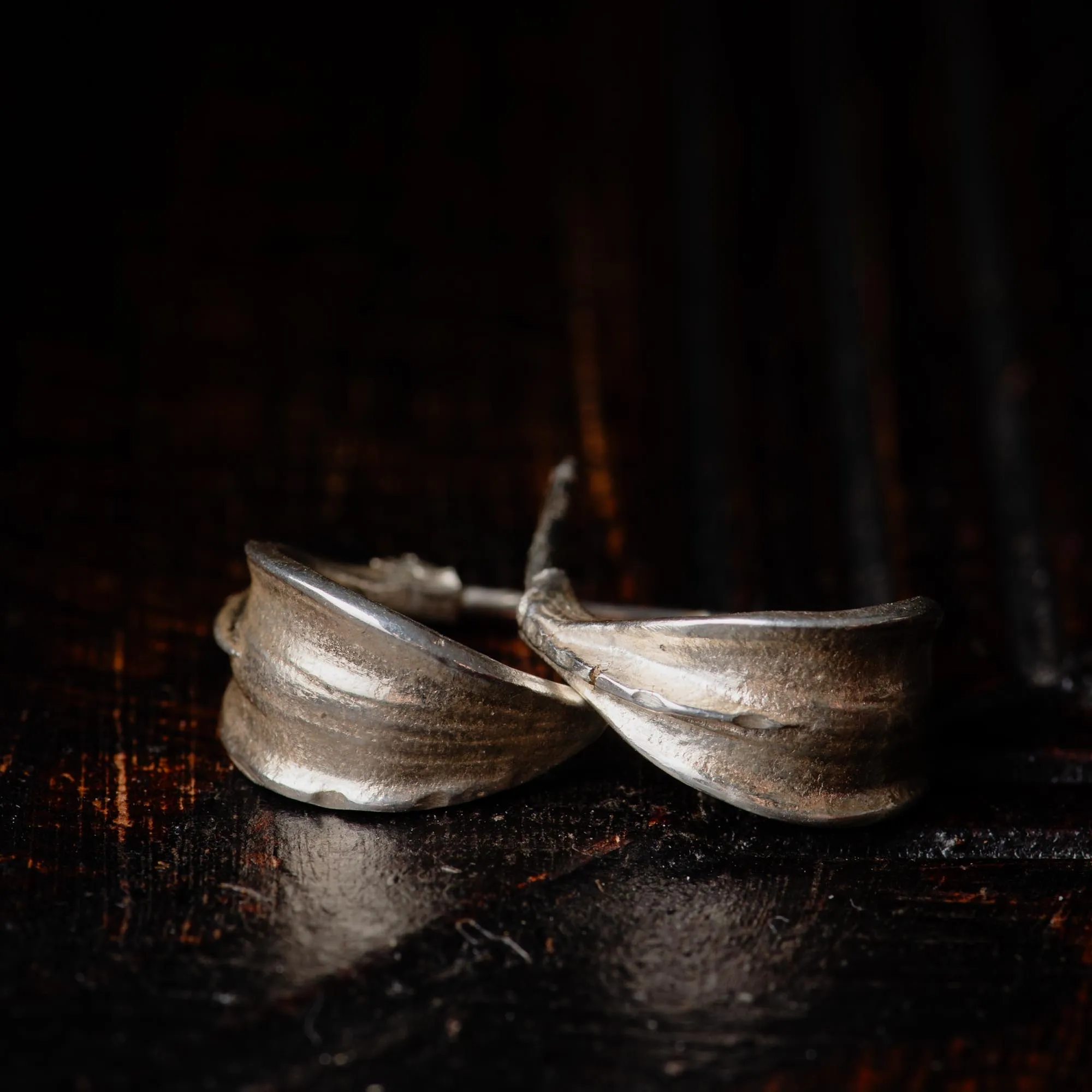 An image showing sterling silver tiny hoops