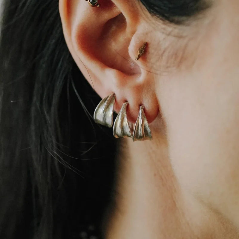 An image showing 3 sterling silver huggies hoops